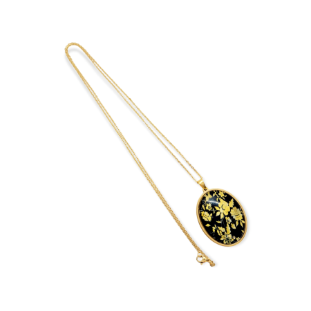 Necklace steel gold flowers background black